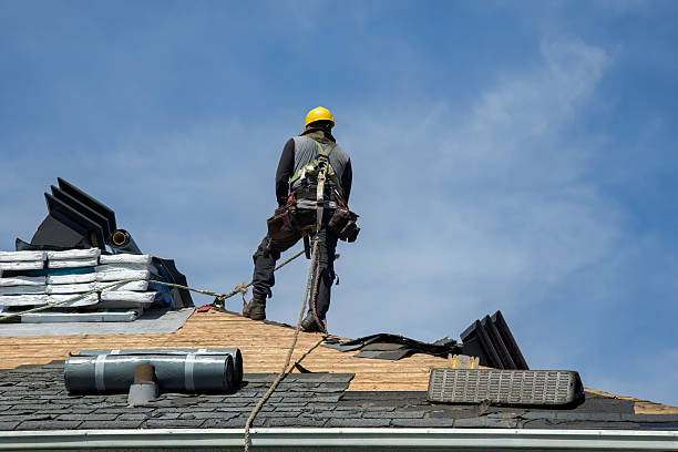 Professional Flat Roof Repair technician working in Manton, MI